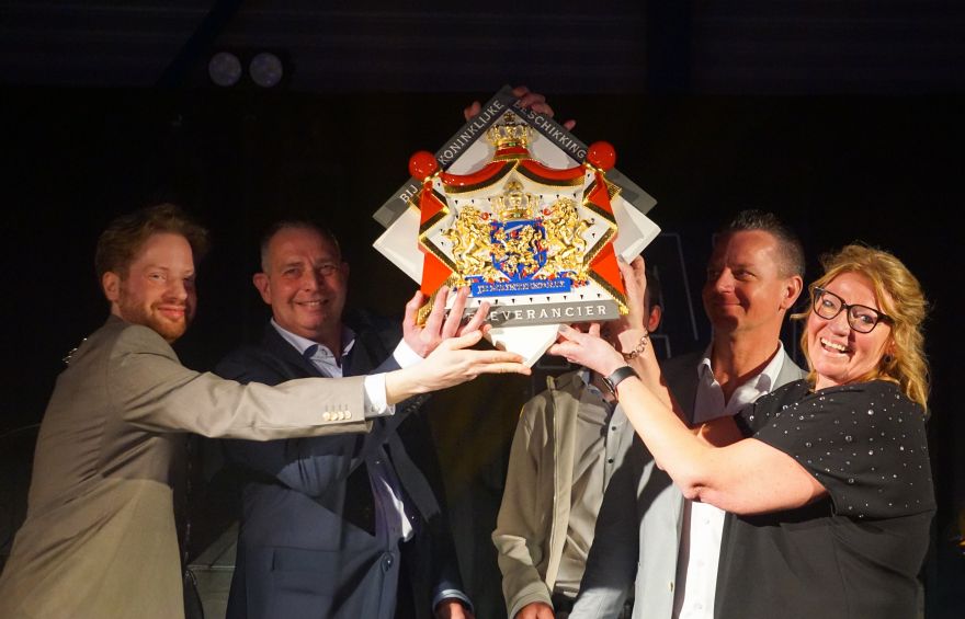 Burgermeester Vermeulen reikt op 1 maart het Predicaat Hofleverancier uit aan Woudenberg Dranken